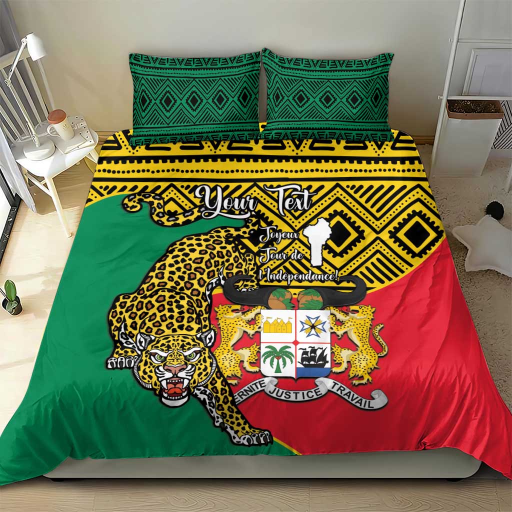 Green red yellow bedding duvet with leopard coat of arms and geometric trim on bed