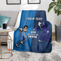 Blue custom cricket blanket on floor with USA and India players graphic and “YOUR TEXT”