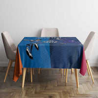 Blue cricket tablecloth with player silhouettes and orange and pink side panels.