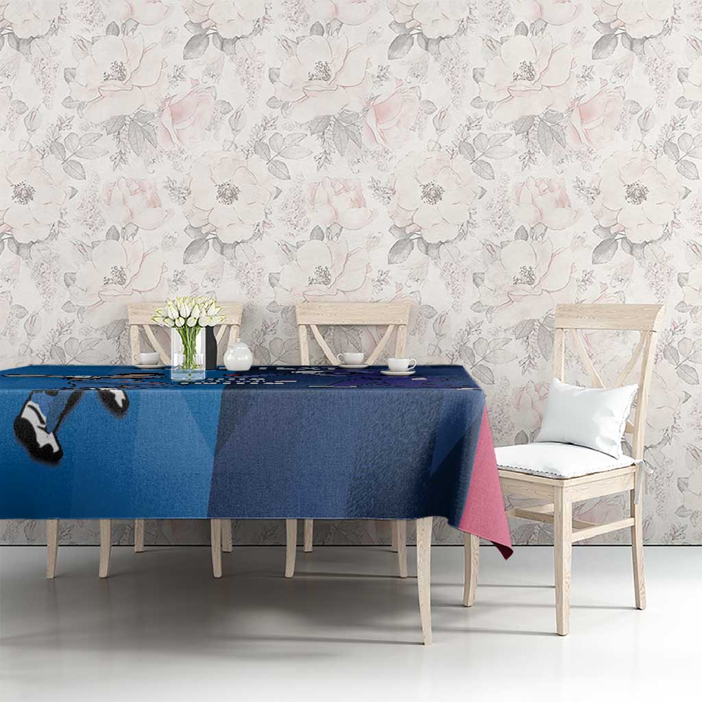 Blue cricket-themed tablecloth with player silhouettes and dark graphic pattern.