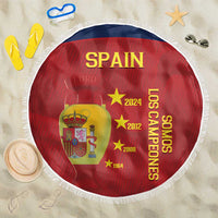 Red round Spain beach blanket with white fringe, Spain crest, stars, and 'Los Campeones' text