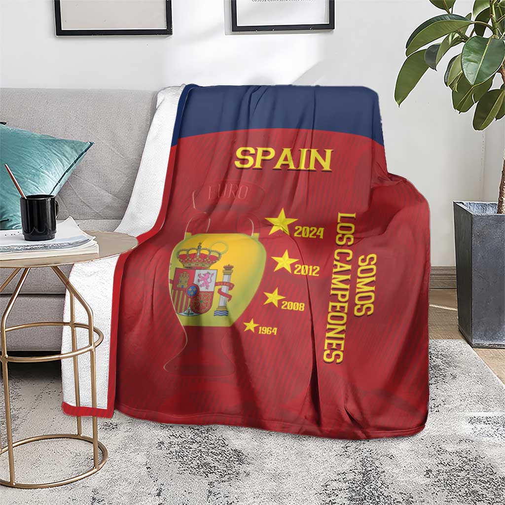 Spain football blanket, red and navy, showing SPAIN and gold stars with 'Los Campeones'