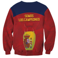 Unisex Spain football sweatshirt, red and navy, back graphic reads 'Somos los campeones'