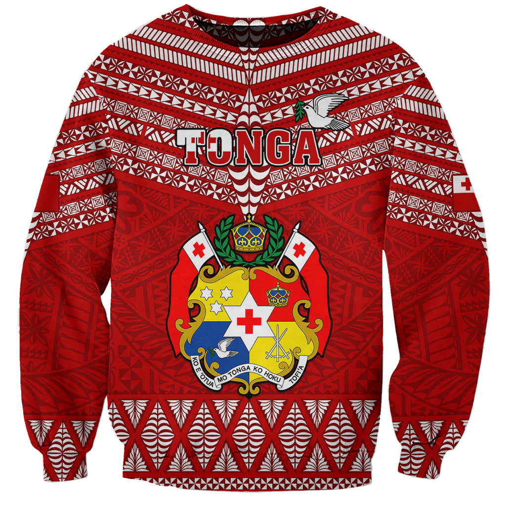 Red rugby sweatshirt with white geometric pattern and central Tongan crest