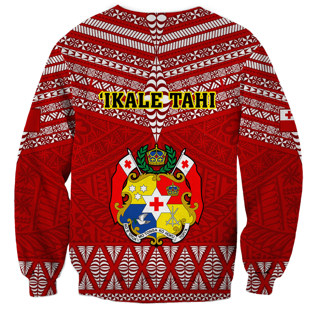 Red rugby sweatshirt with IKALE TAHI lettering and central Tongan crest