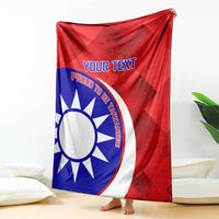 Red personalized badminton blanket with sun logo and “YOUR TEXT,” draped like a cape