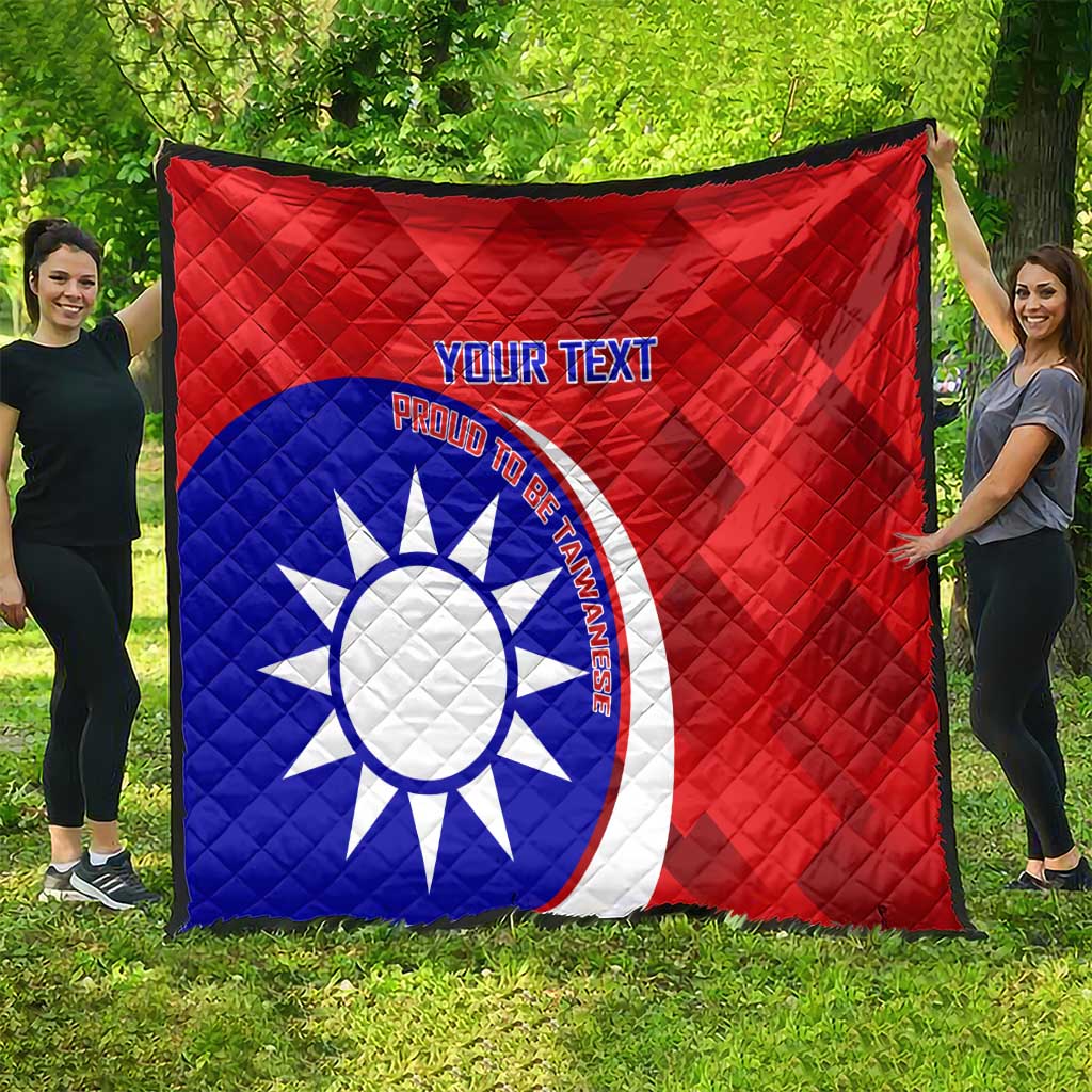 Red and blue quilt featuring white sun emblem, red border, and custom text center panel