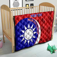 Red and blue quilt with white sun emblem and custom text, sized for a crib mattress