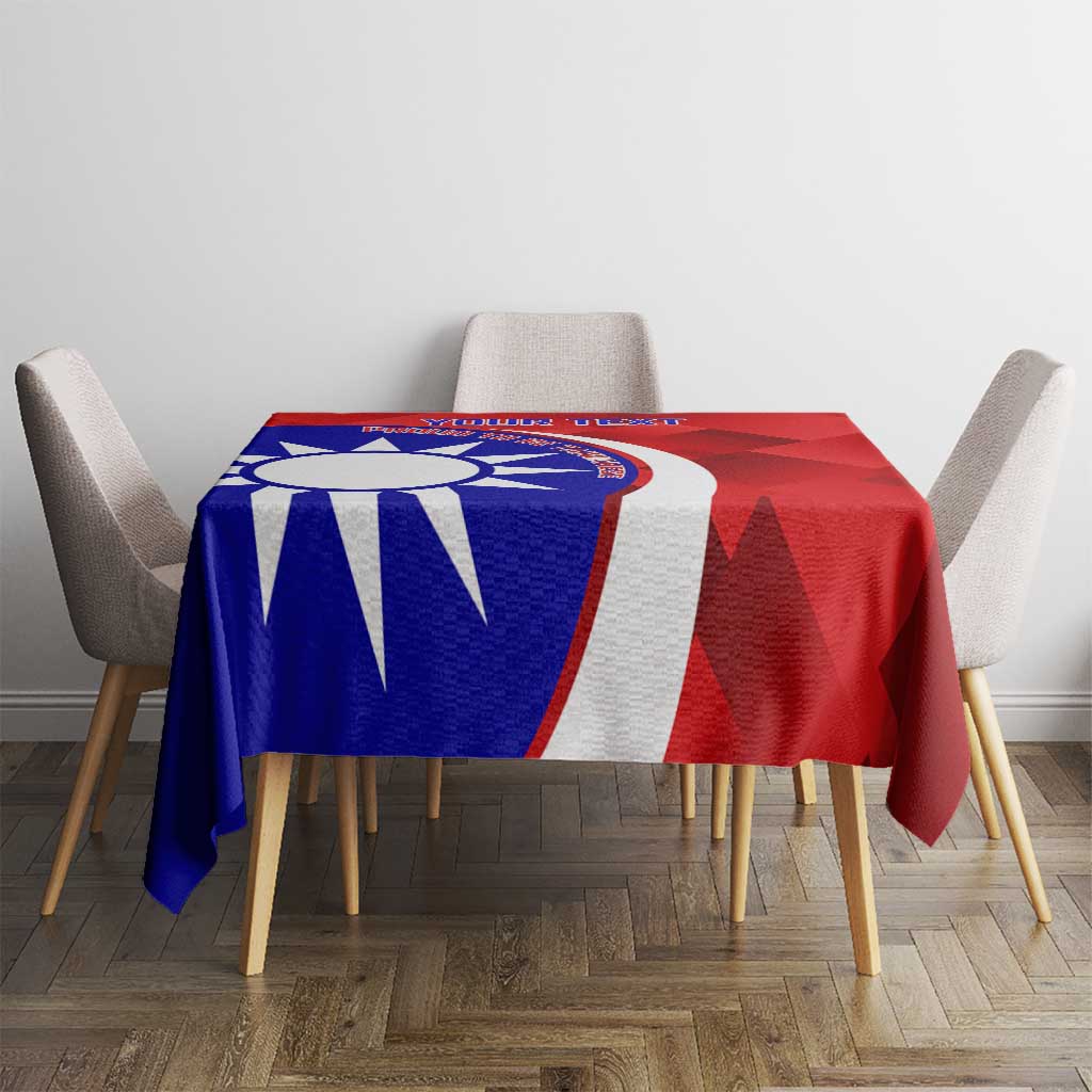 Red and blue badminton tablecloth with circular emblem on dining table