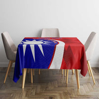 Red and blue badminton tablecloth with circular emblem on dining table