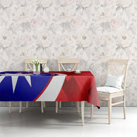 Red badminton tablecloth on dining table with blue-and-white emblem panel