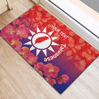 Red rubber doormat close view with Taiwan emblem, pink flowers, and custom text