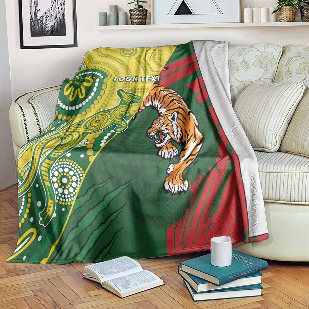 Green cricket blanket with tiger graphic, yellow pattern, and red diagonal stripes