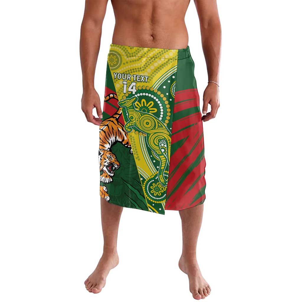 Green printed sarong wrap with tiger face, red stripes, and paisley graphics