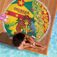 Round fringed beach blanket with Grenada crest and bird illustration in green, yellow, red.