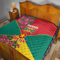 Grenada 1974 quilt blanket on bed, quilted flag design with floral accents