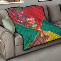 Grenada 1974 quilt on sofa, quilted red, green, and yellow flag with floral print
