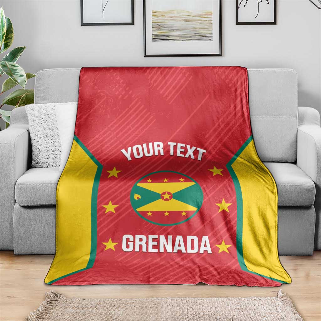 Grenada cricket blanket draped over sofa, red and yellow, 'YOUR TEXT' and GRENADA crest