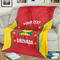 Grenada cricket blanket on armchair, red face with yellow trim, 'YOUR TEXT' and crest