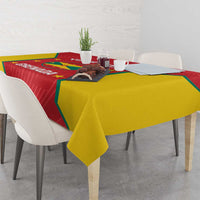 Grenada cricket tablecloth with red center panel and yellow side drape