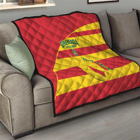 Red and yellow football quilt with Grenada Spice Boys logo and football graphic, diamond pattern