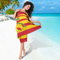Red and yellow striped football sarong with central Grenada logo and text
