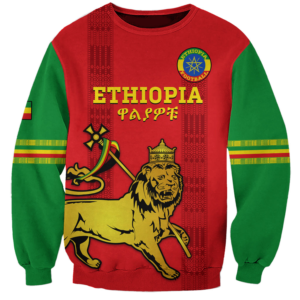 Unisex football sweatshirt in red with green sleeves, featuring Ethiopia-themed front graphic