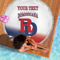 Close-up round beach blanket with fringe, white Dominican flag design and custom text, DB logo