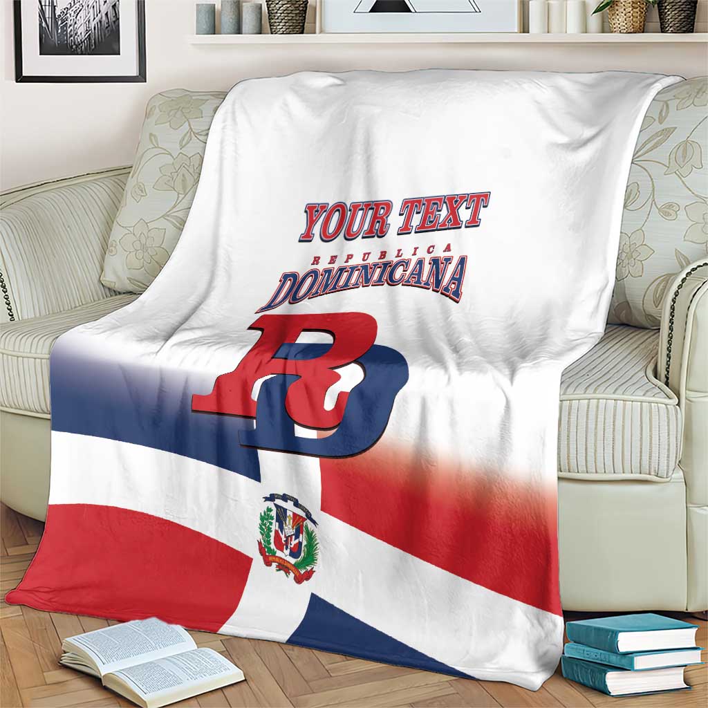 Dominican Republic baseball blanket with custom text and large R, on cream armchair