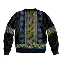 Black bomber jacket back with blue and yellow folk striped embroidery and ribbed hem