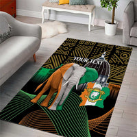 Black African patterned area rug with elephant graphic, green and gold lines, and 'YOUR TEXT'