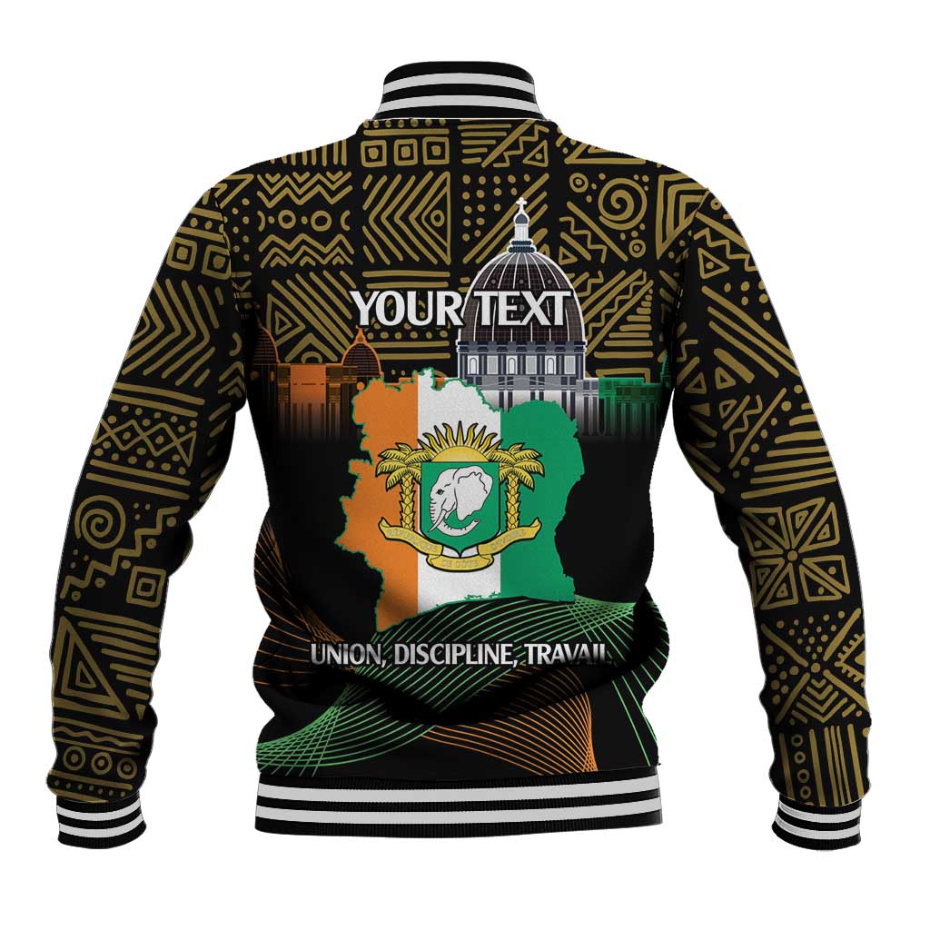 Black baseball jacket back with elephant crest, flag graphic, gold geometric trim, striped hem