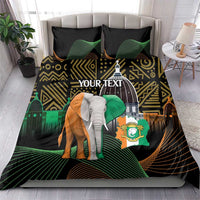 Black bedding set with elephant, crest badge, and gold geometric motifs with green accents