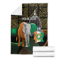 Ivory Coast elephant blanket with YOUR TEXT and flag emblem, shown folded with stack