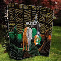 Personalized quilt on grass with elephant and green flag on black geometric African pattern