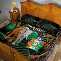 Black quilt bed set with elephant graphic, green-gold patterns, and YOUR TEXT panel