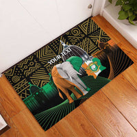 Black rubber doormat with elephant and African geometric design, custom 'Your Text'