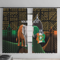 Two window curtain panels with elephant and flag crest, geometric swirls on dark fabric