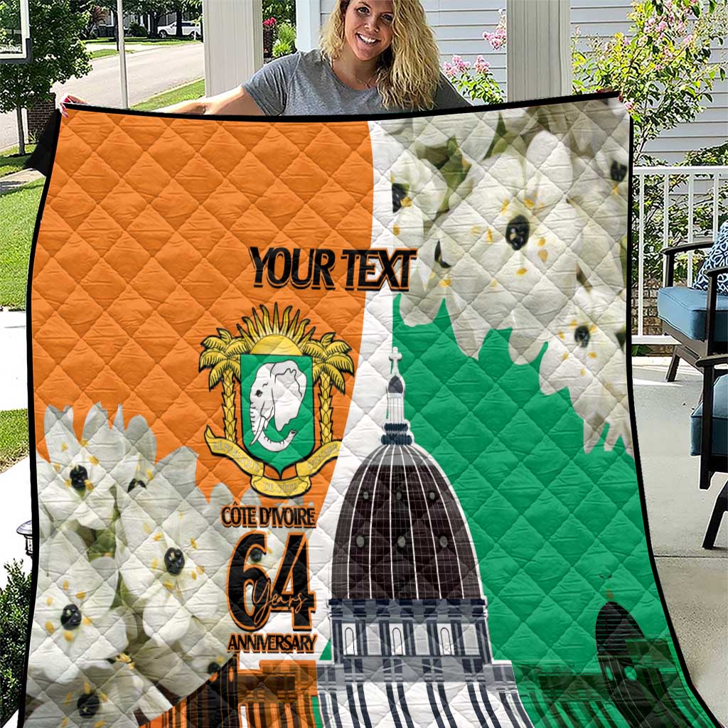 Personalized quilt with orange, green, and white flag-style artwork and YOU R TEXT