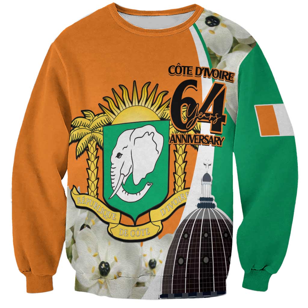 Orange crewneck sweatshirt with green side panels and front crest graphic