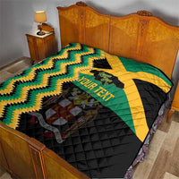 Custom Jamaica football quilt on bed showing green/yellow chevrons, black quilting, star and your text