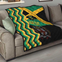 Custom Jamaica football quilt draped on sofa with green/yellow zigzag chevrons, black quilt, your text