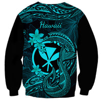 Black sweatshirt with turquoise Hawaii text and fishhook plumeria tattoo back print