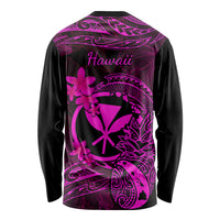 Unisex long-sleeve shirt back, black with pink “Hawaii” text and Polynesian flower graphics.