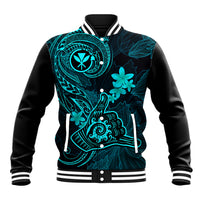 Turquoise and black baseball jacket with tribal floral print, snap front, ribbed striped cuffs