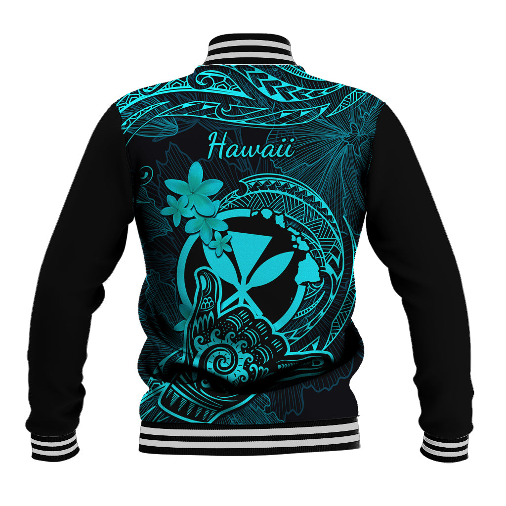 Back of turquoise baseball jacket with 'Hawaii' graphic, tribal shell and flower print, ribbed hem