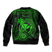 Green and black unisex bomber jacket, back print with Hawaii text and tribal plumeria