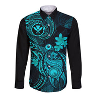 Long sleeve button shirt with black base and turquoise Polynesian floral print, front