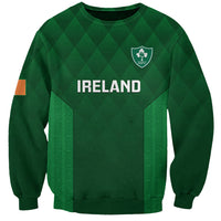Green rugby sweatshirt with diamond pattern, Ireland crest, and split-panel graphic
