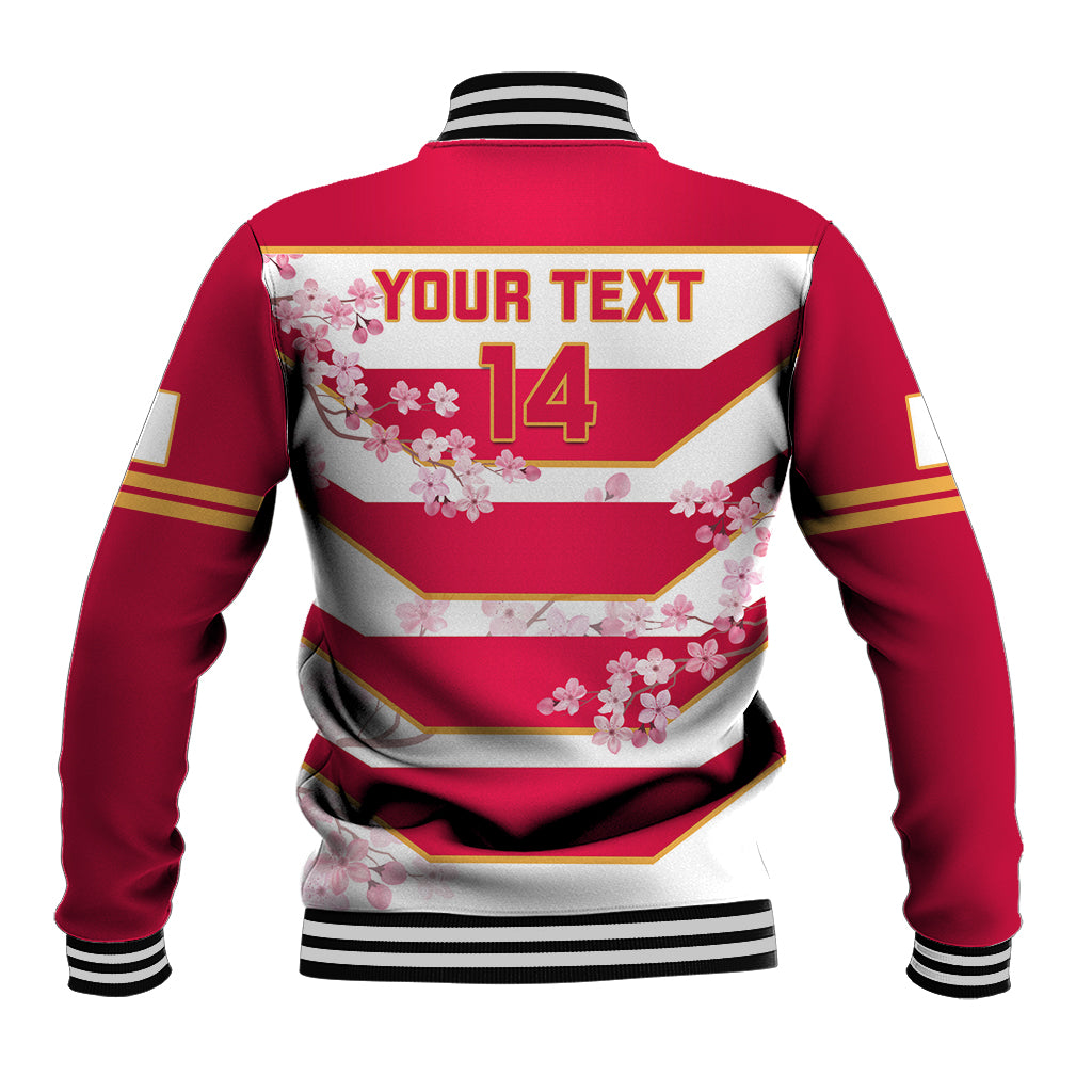 Red baseball jacket back with white stripe pattern, pink cherry blossoms, 'YOUR TEXT 14'